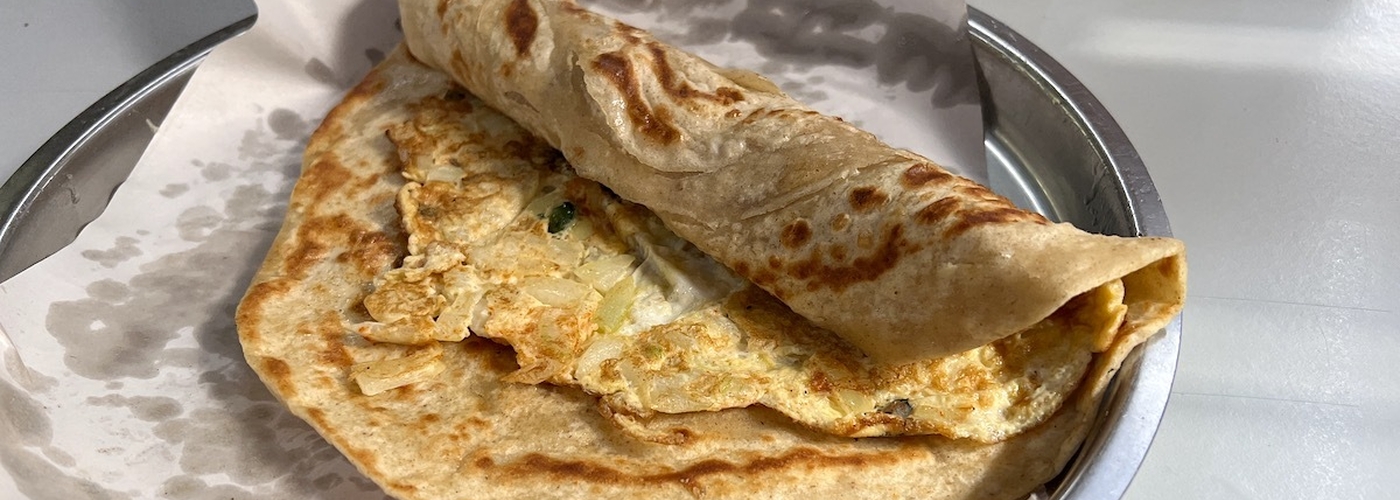A Rolled Anda Crispy Spiced Egg Paratha From Paratha Hut Behind The Car Wash Levenshulme Manchester