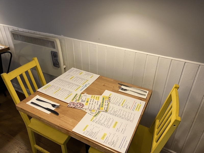 Cute Interiors With Yellow Wooden Chairs And Tables At Pizzammore Sale Manchester