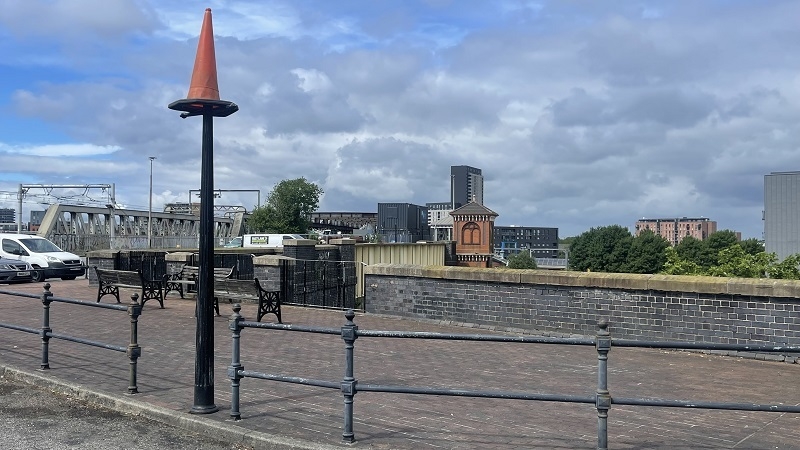 a traffic cone on top of a lamppost at Castlefield Manchester