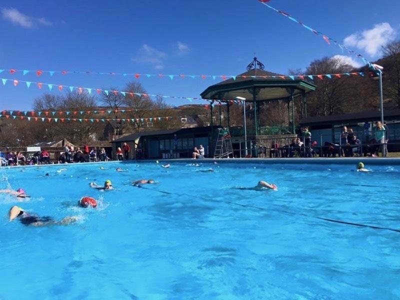 Swimmers at Hathersage swimming pool with bunting