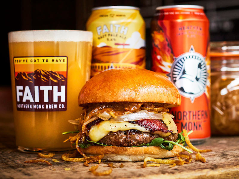 The Honest Burgers Leeds Burger With Cans Of Northern Monk Faith