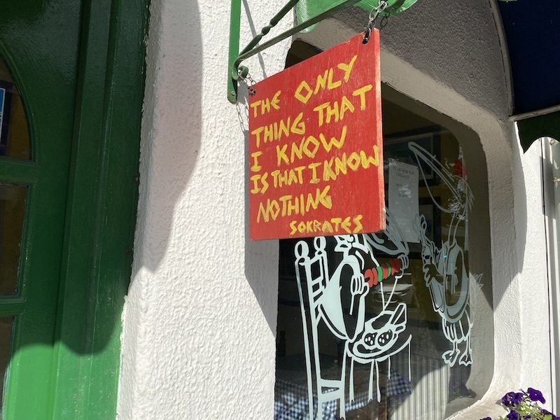 Sign Outside Sokrates Taverna In Sale Food Philosophy