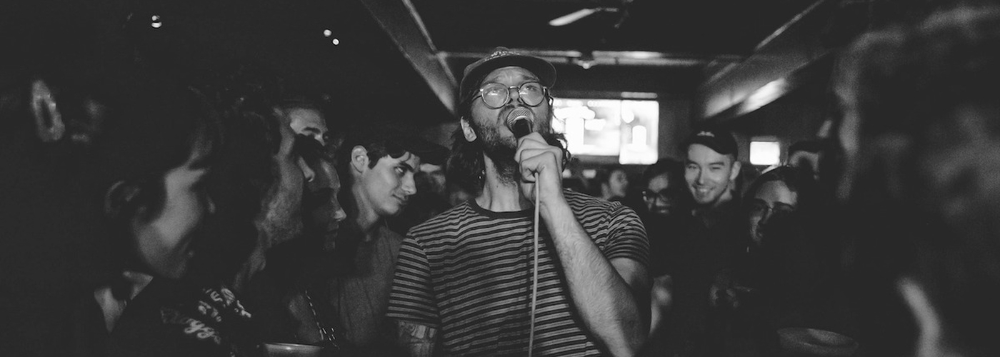 A Man Singing Karaoke In Vina In Manchester