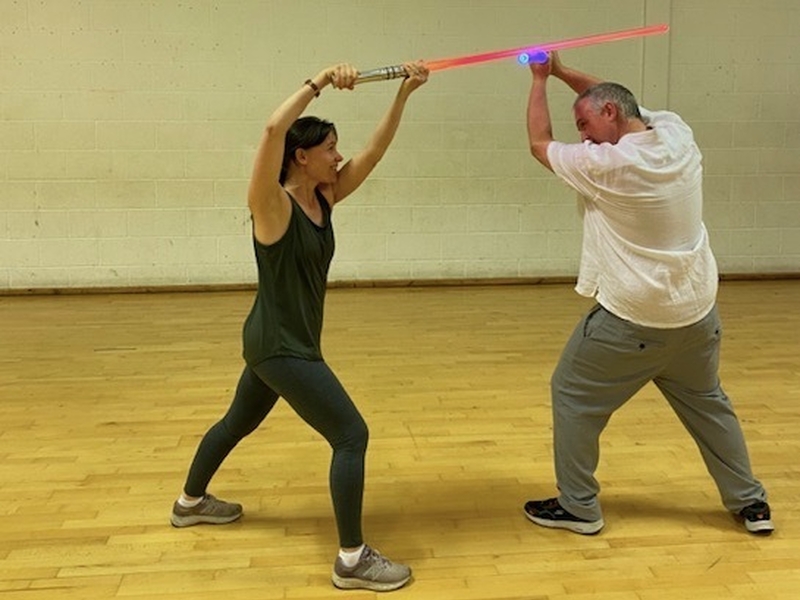 Two people learning lightsaber fencing at Ludosport Academy Manchester