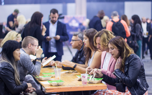 A Group Of People Eating Together