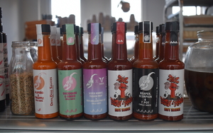 A Line Up Of Devil Dog Hot Sauces At 3 Hands Deli In Manchester Including Some Collaborative Sauces