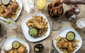 A Picture Of A Spread Courtesy Of Hip Hop Chip Shop In Manchester Including Fish Chips Onions Rings And Sausages