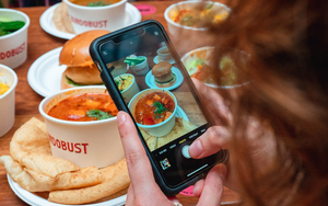 Taking A Photo Of A Table Of Food At Bundobust Brewery