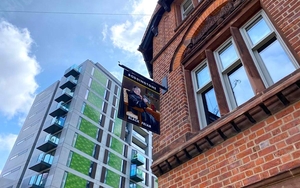 The Black Friar Salford Exterior Next To Modern Tower Block