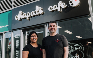 The Team From Chapati Cafe Standing In Front Of Their New Mdeia City Branch Smiling