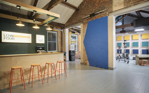 The Interior Of The Low Four Space On Deansgate Mews At The Great Northern Warehouse In Manchester Featuring A Bar By Cloudwater