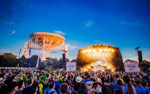A Lit Up Stage And Radio Telescope At Bluedot Festival Jodrell Bank