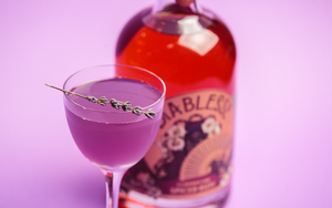 Purple Cocktail With Lavender And A Bottle Of Diablesse Rum