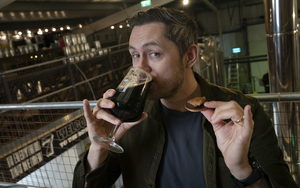 Kit Mcavoy From Seven Brothers Drinking Stout And Holding A Jaffa Cake With Peanut Butter On Top 800 1200