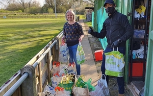 Manzoor Ali Wearing A Mask And A Volunteer With Food Parcels In Manchester 1200 X 800