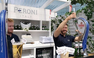 Barmen Serving Pint Of Peroni At Festa Italiana Manchester
