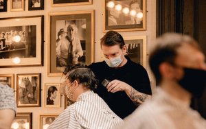 Barbers Hard At Work At Manchesters Barber Barber In Barton Arcade