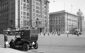 Was the Cunard Building meant to be twice as high?