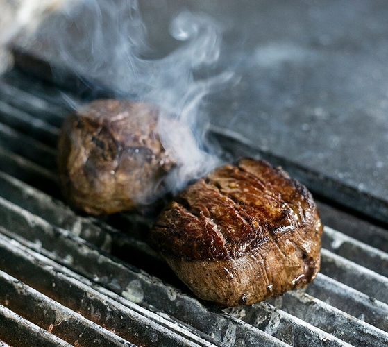 Steak Smoking On The Grill Landscape Low Res