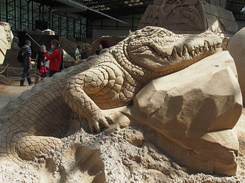 Lob Sandskulptur Reptilien