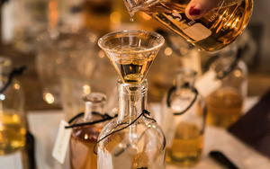 Pouring From Beaker To Blend Bottle