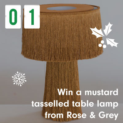 Win a mustard tasslled table lamp from Rose & Grey